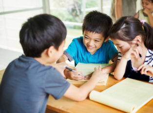 Honeyview_a-group-of-children-in-a-classroom-working-togeth-2022-03-04-02-06-44-utc