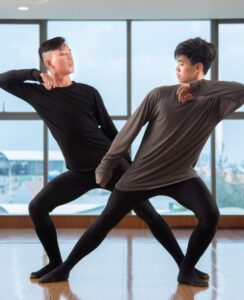 Honeyview_asian-men-dancing-together-2021-08-26-19-52-52-utc