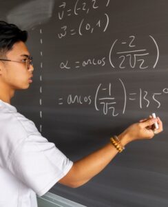 Honeyview_teen-asian-high-school-boy-student-solving-maths-e-2022-07-12-17-23-07-utc